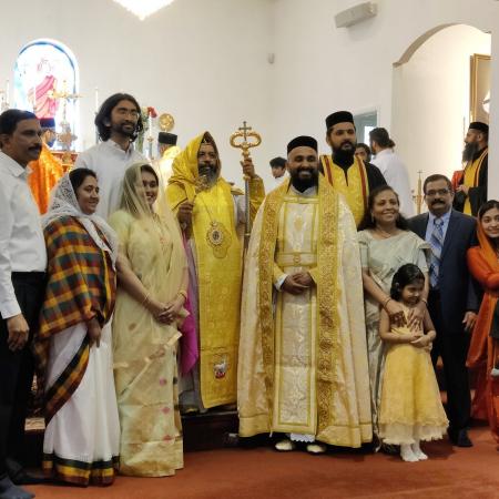 Fr Zachariah with his family and Metropolitan Aprem following ordination